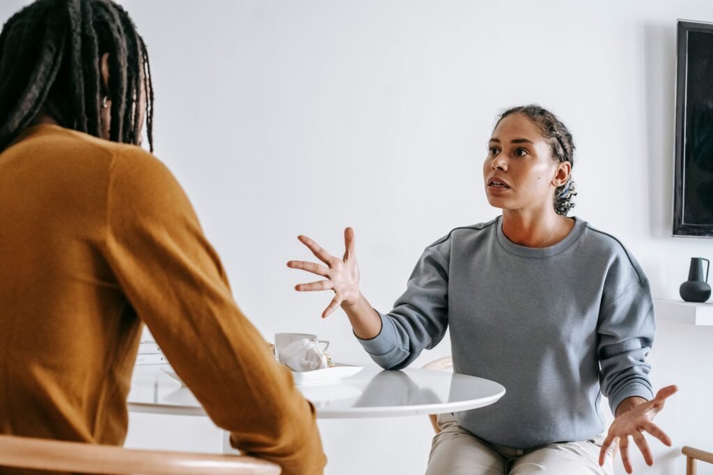 Couple having an honest conversation about their feelings and expectations in a relationship.