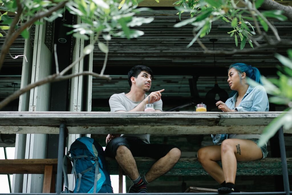 Two people enjoying a meaningful conversation, illustrating emotional connection and compatibility.